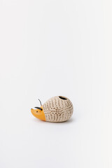 ceramic hedgehog planter on white background