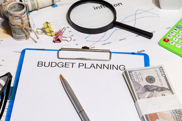 Budget Planning Documents with Graphs on Desk – Personal and Business Financial Forecasting...
