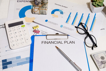 Comprehensive Financial Plan Papers with Graph, Calculator, and Cash – Business Budgeting and...