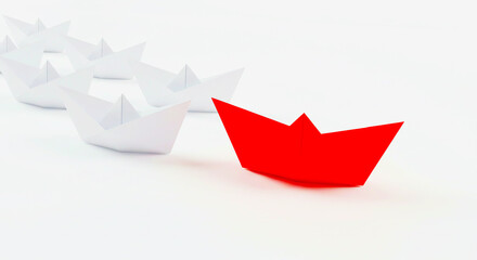 Naklejka premium A red paper boat leads a line of white paper boats on a white surface in a bright studio setting