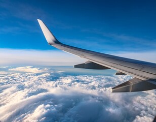 Obraz premium aerial view of an airplane wing soaring above the clouds showcasing the beauty of air travel altitude and the vastness of the sky