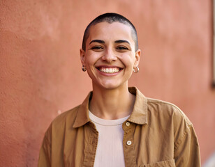 portrait of a young woman,A confident mid-30s South American nonbinary person smiling naturally, standing against a wall