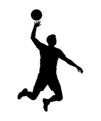 Silhouette of a volleyball player making a jump serve