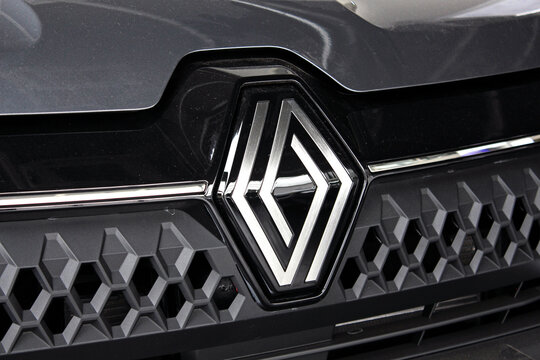 Vinnytsia, Ukraine; May 30, 2025. Close up New Renault logo. Close up New Renault emblem. Grey Renault Kardian logo on front car. Grey Renault Kardian emblem on radiator grille. Front view.