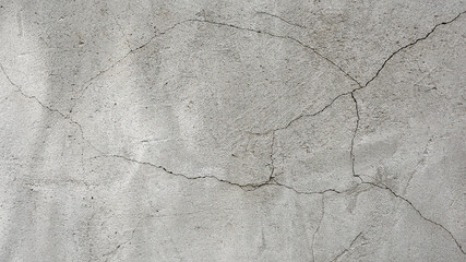 surface wall concrete for background. Abstract of surface wall concrete for vintage background. Wall texture for background. old cracked plaster, grey cement floor, needs repair, restoration