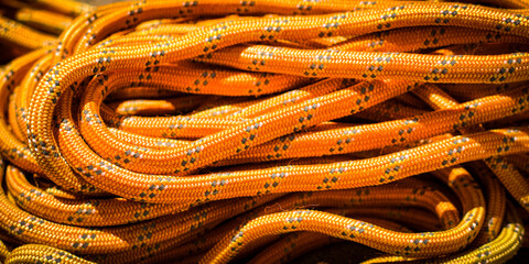 close-up of an orange throw rope. equipment design element or abstract background