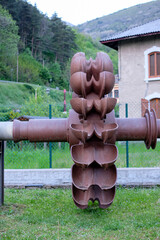 Old Cast Iron Pelton Water Turbine to Generate Electricity by Hydro Power. Pelton turbine wheel....