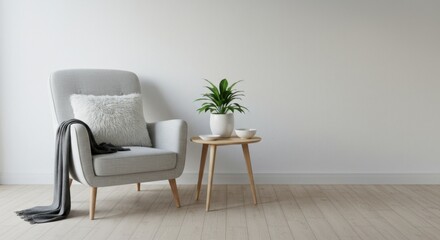 A comfortable gray armchair sits beside a small table with a plant, creating a cozy interior space.
