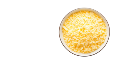 A top down view of shredded cheddar cheese in a white bowl   isolated on transparent background