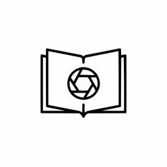 Minimal camera lens embedded in an open journal &mdash; capturing and reflecting.