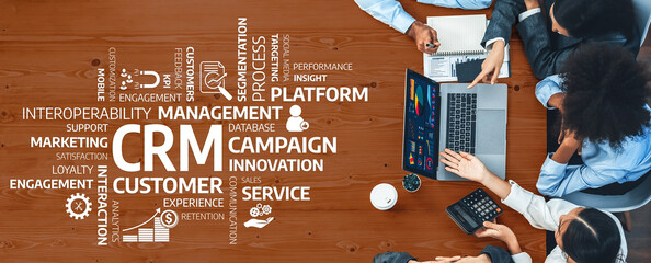 Panorama top view multiracial analyst team use BI dashboard display on laptop screen, analyzing financial data for strategic decision. Fintech analyzes marketing indicators. Concord Amity