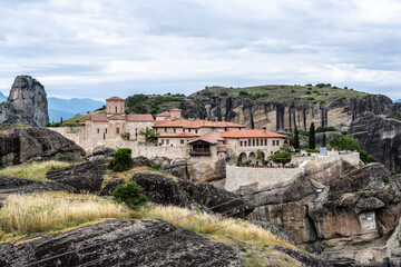 ancient churches in the remote mountains of the Meteora Valley in Greece on a May day