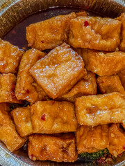 General Tso’s Chicken Made With Tofu In A Take Away Container