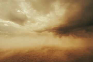 Obraz premium Desert sandstorm sweeps across the arid landscape under a dramatic and brooding cloudy sky at dusk