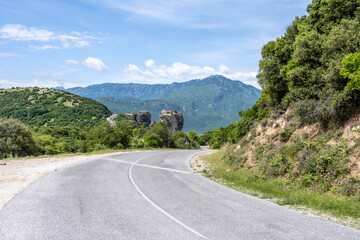 Naklejka premium ancient churches in the remote mountains of the Meteora Valley in Greece on a May day