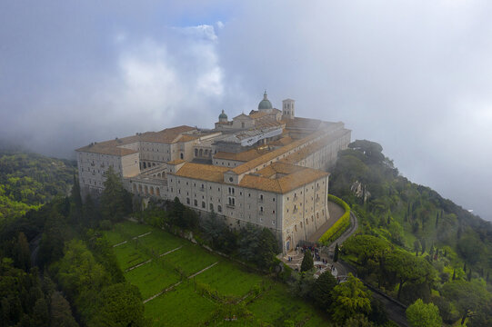Monte Cassino monastery in the morning mist. Monte Cassino Abbey, the first monastery of the Benedictine order, located to the south of Rome, at the top of Mount Cassino