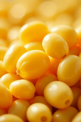 A close-up shot of a cluster of bright yellow berries
