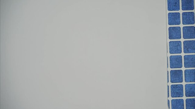 Samples of PVC lining for pools. Various samples of vinyl coating for swimming pools. Pool color ideas. Stop motion