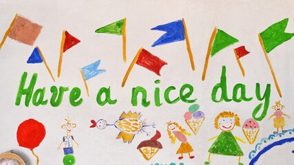 A child`s drawing on the wall,with writing :Have a nice day.