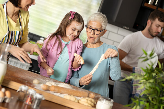 Family baking together in a cozy kitchen space