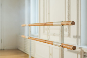 Empty ballet dance studio with barre. Professional ballet barre for stretching practicing dancing positions in dance school Dance hall ready for ballet class training. Ballet school © Юлия Завалишина