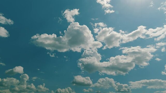 A Beautifully Cloudy Sky Featuring a Bright and Blue Background for a Perfect Day Time lapse.