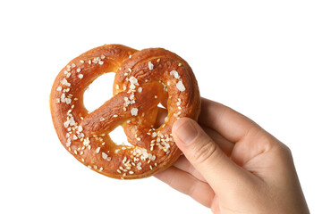 Woman with tasty pretzel on white background, closeup