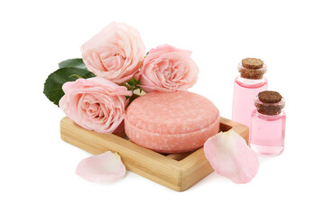 Aromatic soap bar, roses and cosmetic products isolated on white