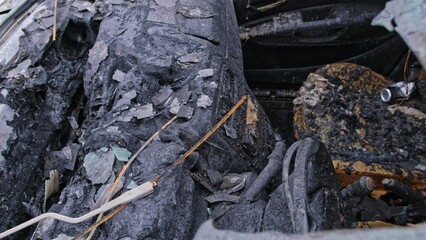 Burnt Car Wreck Interior with Melted Plastic Destroyed in Tragic Deadly Road Accident with Fatalities