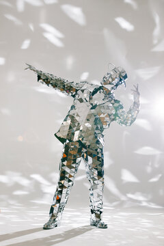 Fototapeta Mirror dancer performing in sparkling silver costume