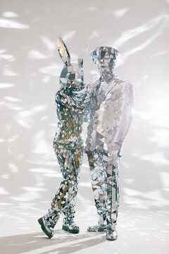 Fototapeta Mirror dancers performing in sparkling costumes