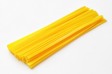 A bundle of long, yellow pasta strands