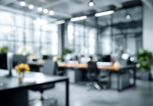 Stock image featuring a blurred office workspace in the evening, complete with a cityscape interior for use as a business presentation background
