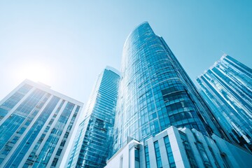 Obraz premium Modern city urban landscape featuring reflective skyscraper business office buildings from a bottom-up perspective, stock image
