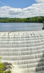 water pouring down the croton dam in westchester new york (natural and man made waterfall river) bridge stone structure park gorge © Yuriy T