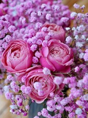 Close-Up of Pink Roses and Baby's Breath Bouquet