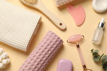 Gordijnen Clean waffle towels, cosmetic products and supplies on beige background, flat lay © New Africa
