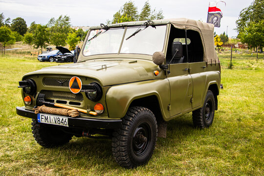 Classic green UAZ off-road vehicle parked outdoors. Iconic Soviet-era 4x4 known for its rugged design and durability, popular in Russia and Eastern Europe. Swiebodzin 25.05.2025.