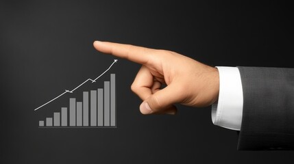 An upward trending bar graph is being drawn in chalk on a dark surface by a hand, representing growth and success