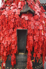 Red ribbons or cloth talismans tied to pillars in Taoist temples at Yuntaishan Geopark is the most beautiful geopark in Henan Province, China.It is listed as the first World Geopark in the world.