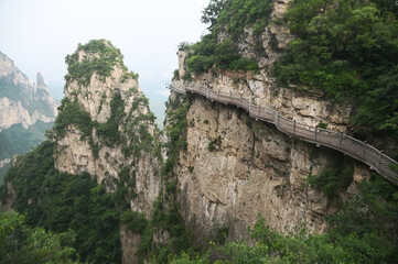 Walkway on the Cliff in Yuntaishan Park is the most beautiful geological park in Henan Province, China. It is listed as the first geological heritage site in the world and is a 5A-level tourist.