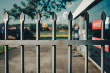 Metal fence with spikes