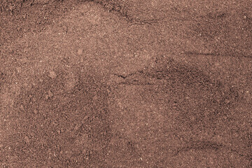 Ground coffee on a flat surface. Background texture