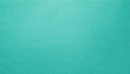 Close-up view of a solid, textured teal surface