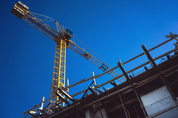 Fototapeta premium Crane and wooden formwork