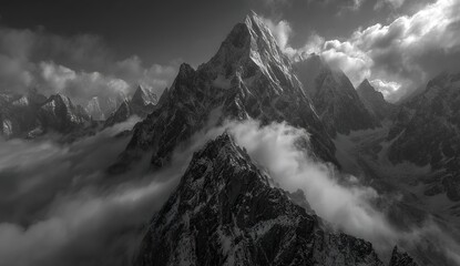 Majestic Snowy Mountain Peaks in Mist