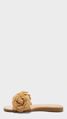 Fashionable women’s slip-on sandals designed with a floral accent for summer outings and casual wear