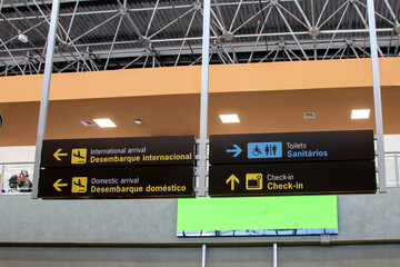 Airport Signs for International and Domestic Arrivals, Toilets, and Check-In
