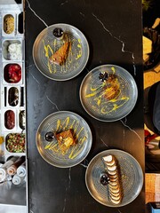 Elegant fine dining plates with gourmet food presentation, upscale restaurant cuisine and culinary arts