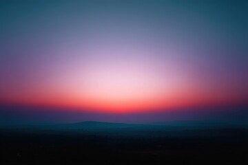 Obraz premium Colorful Sunrise Over Cityscape